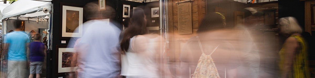 visitors browse the artist market