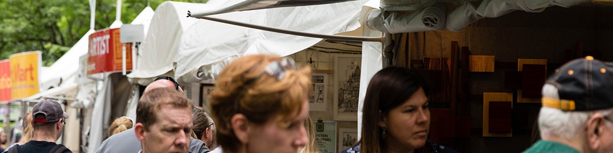 visitors browse the artist market